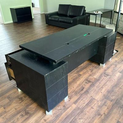BLACK EXECUTIVE’S DESK | Black wood with tiered design, two banks of drawers and a keyboard slideout - h. 30 x w. 31.5 x l. 79 in

