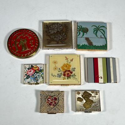 (8pc) VINTAGE MAKEUP COMPACTS | Compacts and pill boxes, including a faux pearl decorated Rex compact, brass and enamel decorated...