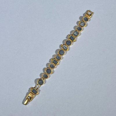 ANTIQUE COIN STYLE BRACELET | Designed as a gold-tone bracelet with miniature antique/ancient-style coins. - l. 7 in

