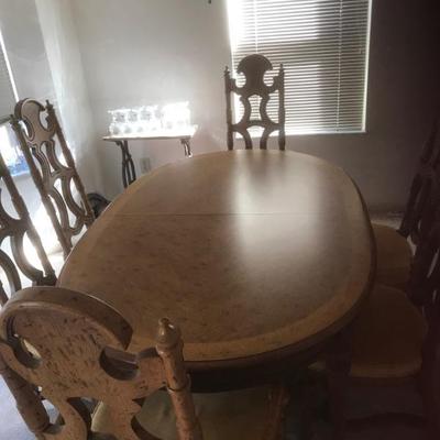 Table and 6 chair with pads and leaves