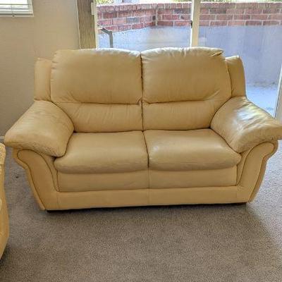 Lot #76 - Scandinavian Designs Leather Buttercream Loveseat