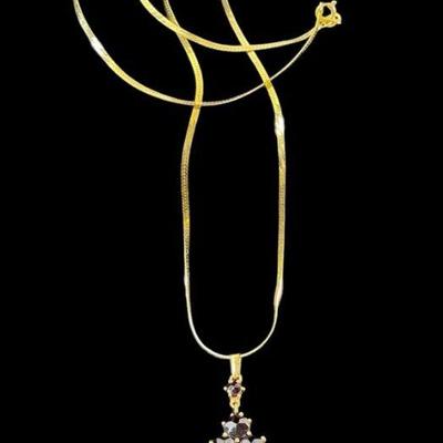 LYZE921 14k Gold Chain With Bohemian Garnet Pendant	This is a gorgeous bohemian garnet pendent that comes with a 14k gold chain that...