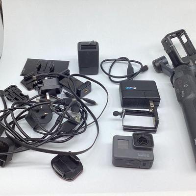 WATA312 GoPro Hero 5 With KARMA Grip	GoPro with stabilizer & assortment of GoPro accessories & charging cords. Manuals also...