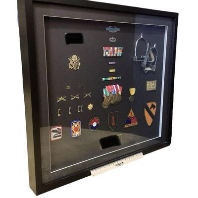 WATA315 Large Shadow Box Of Military Service History	A long decorated career of service. Professionally framed with lots of pins....