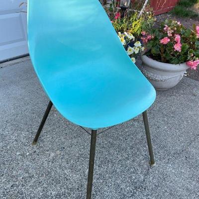 KIHE721 Tiffany Blue MCM Bucket Chair	The legs show some wear but the seat is very clean.  
