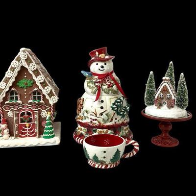 CT206 Christmas Collectibles	Gingerbread house that lights up. Does work and was tested. Tracy Porter snowman cookie jar. Illuminated 13