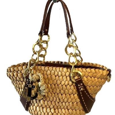 KAAR901 Vintage Juicy Couture Nautical Straw Weave And Leather Bag	This gently used handbag is in very clean and in good condition. It...