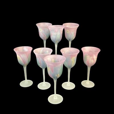 JAKE554 Reuven-esque Stemware	8 Long stemmed wine glasses in the manner of (no signature) Reuben Art glass. 9.5”
