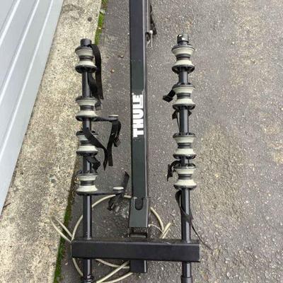 FLRO618 Thule Hitching 4-bike Post	This lot includes a Thule four bike "hidden hitch" bike post. Old bike lock attached, key...