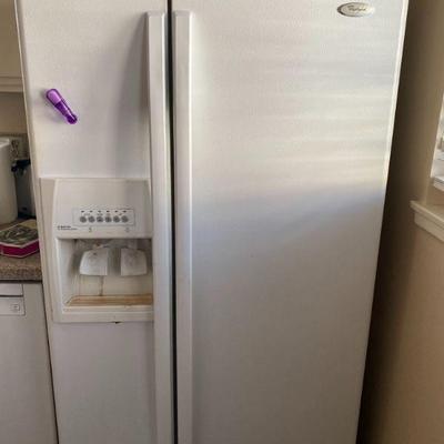 Side by side Whirlpool refrigertator