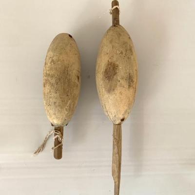 Antique fishing floats in old paint