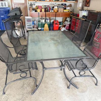 Black Metal Patio Set: Outdoor Table w/ 4 Rocker Chairs	