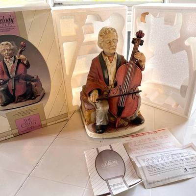 Melody In Motion - The Cellist - Handpainted Porcelain Bisque
