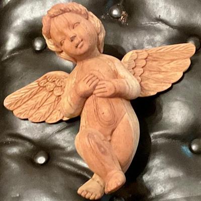 Carved wooden angle