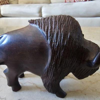 Hand-carved iron wood bison