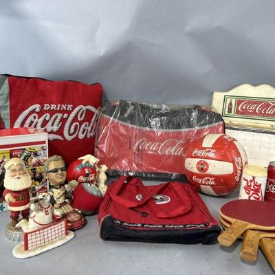 Lot 207 | Coca Cola Bags, Bobble Heads, Paddles & More
