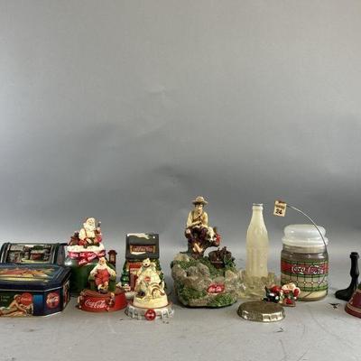 Lot 342 | Vintage Coca-Cola Figurines, Candles, & More
