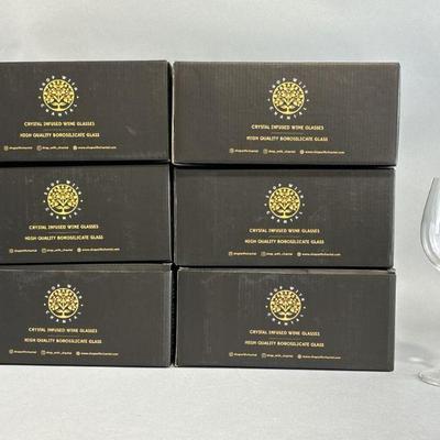 Lot 461 | 12 Glass Crystal Infused Wine Glasses: Tiger Eye
