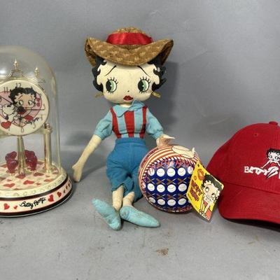 Lot 220 | Betty Boop Hat, Clock, Ball & Doll
