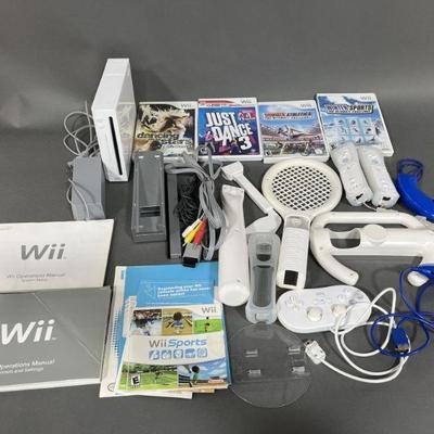Lot 40 | Wii Console Accessories & Games
