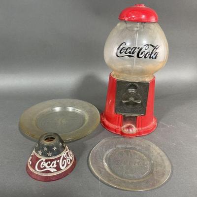 Lot 116 | Coke Candy Machine, Glass Plates & Lampshade
