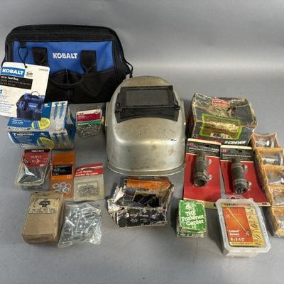 Lot 182 | Vintage Welding Helmet, Screws, Tool Bag, & More
