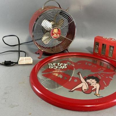 Lot 304 | Betty Boop Fan, Mirror, & Set of 4 Shooters
