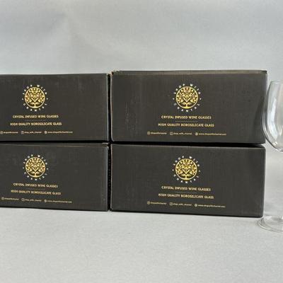 Lot 450 | 8 Glass Crystal Infused Wine Glasses: Rose Quartz
