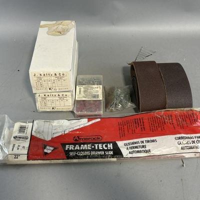 Lot 412 | Vintage Sandpaper, Screws, & More
