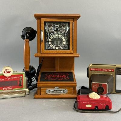 Lot 90 | Vintage Coca-Cola Phone, Cameras, & More
