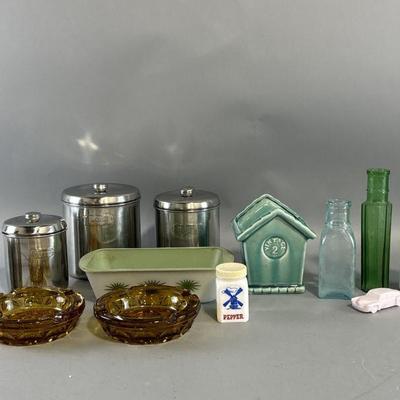 Lot 22 | Vintage Kitchen Decor, Ashtrays, Bottles, & More
