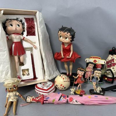 Lot 102 | Betty Boop Collection Figures, Umbrella & More

