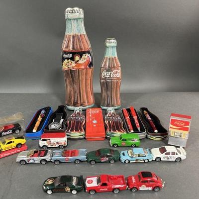 Lot 213 | Coca-Cola Tins, Pens, Watch & Die Cast Cars
