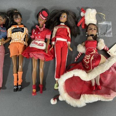Lot 215 | Coca-Cola Barbies & Madame Alexander Doll

