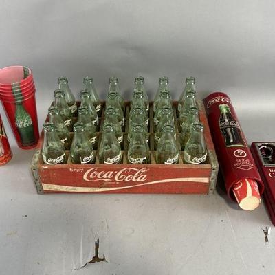 Lot 302 | Vtg Coca-Cola Glass Bottles, Cup Dispenser & More
