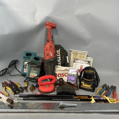 Lot 183 | Tool Battery Chargers, Debris Bags, Battery & More
