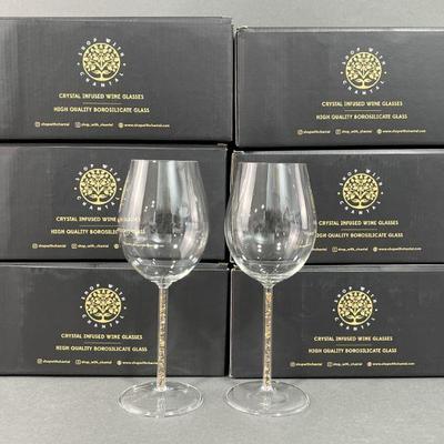 Lot 459 | 6 Pairs of Tigers Eye Infused Wine Glasses
