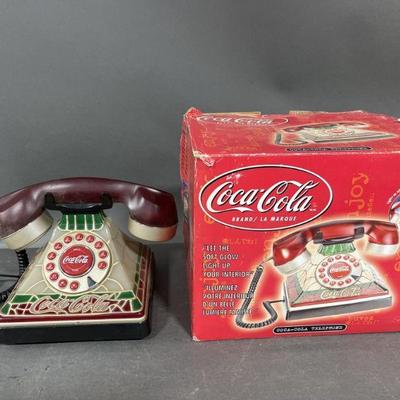 Lot 209 | Pair of Coca-Cola Faux Stained Glass Phones
