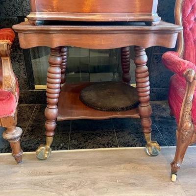 Unique antique table with claw feet 