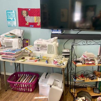Lots of sewing machines by Singer 