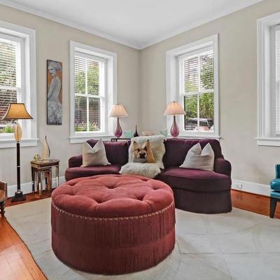 MASSIVE ROUND TUFTED OTTOMAN IN BURNT SIENNA VELVET WITH BULLION FRINGE