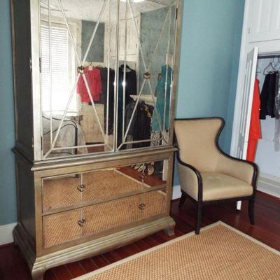 CURREY AND CO. MIRRORED PARISIAN CHEST ON CHEST WITH UTTMOST CHAIR
