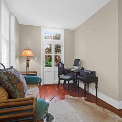 MASTER BEDROOM SITTING AREA WITH SOFA AND DESK 