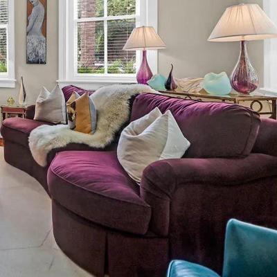 AUBERGINE PURPLE VELVET CURVED AND ROUNDED THREE SEAT SOFA