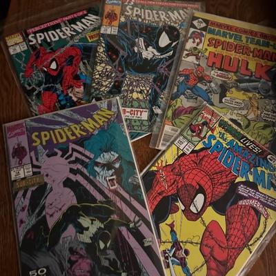 Several vintage comic books 