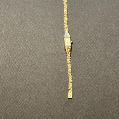 Wow her for Christmas with this gorgeous 14k gold wristwatch