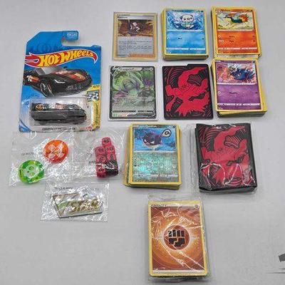 #1908 • Pokémon Cards, Hot Wheels & Dice
