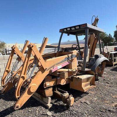#114 • Case 580M Extandahoe Skeleton
