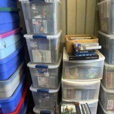 #7590 • (14) Totes & Boxes of DVDs
