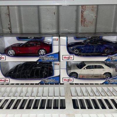 #7510 • (4) Maisto Die Cast Cars
